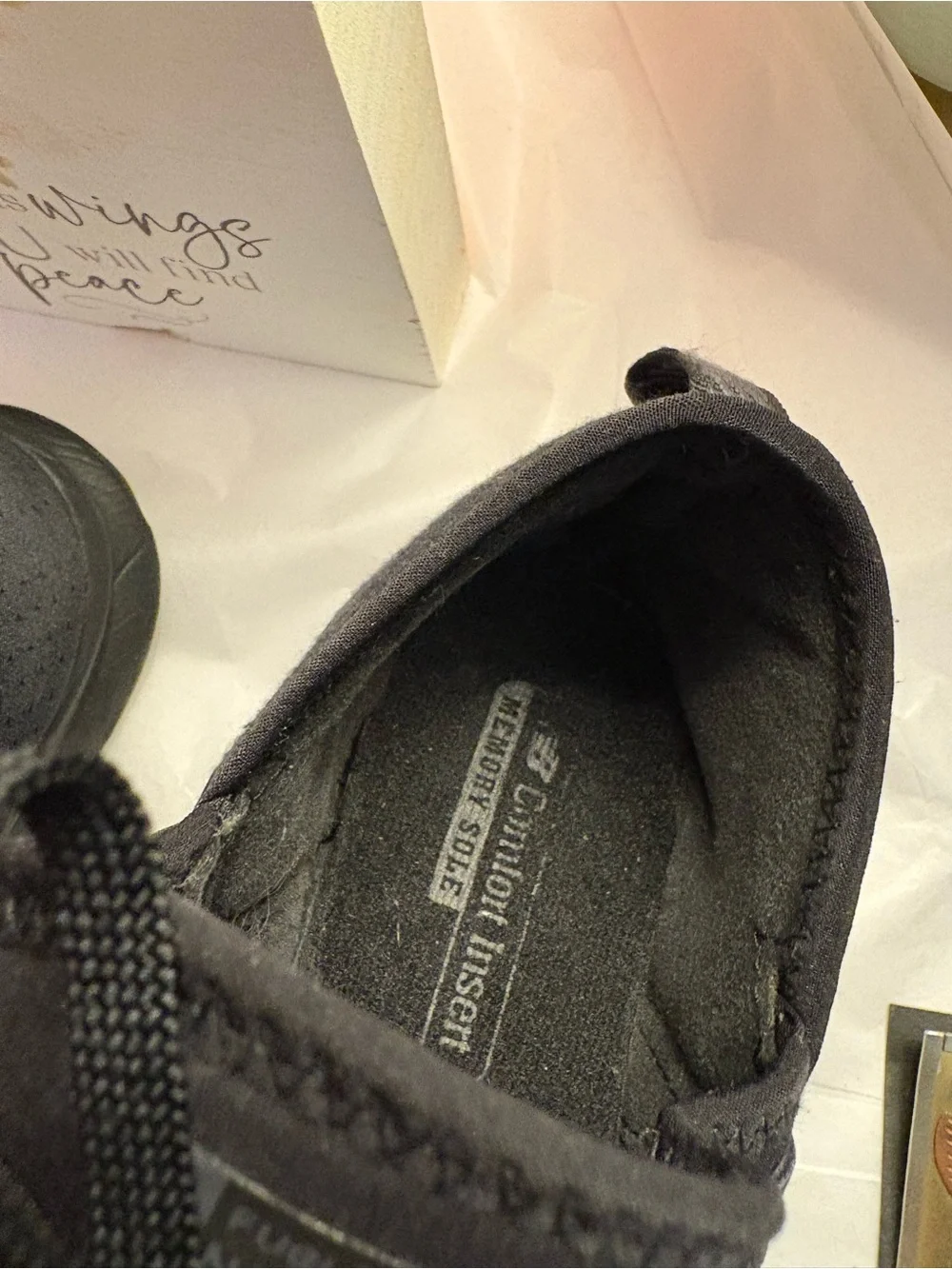 New Balance Woman’s Black Slip-On Knit Sneakers